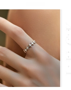Detailed view of s925 sterling silver ring featuring continuous geometric star patterns