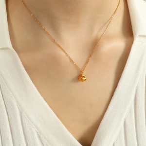 Minimalist gold teardrop pendant necklace for women with polished mirror finish