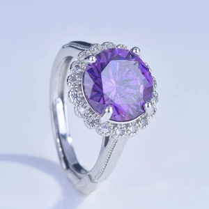 Elegant 5 carat purple round gemstone ring with halo diamond setting on silver band