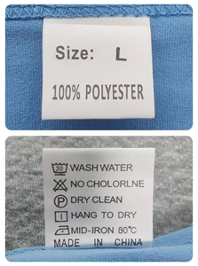 Detail view of clothing wash care label showing 100% polyester material and size L mark