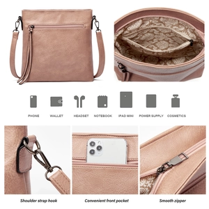 Close-up of pink faux leather bag showing adjustable shoulder strap and smooth zipper detail