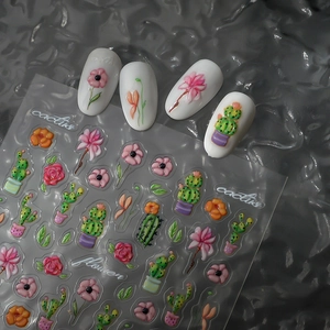 Detail of 5D embossed cactus and flower nail stickers with realistic 3D texture and patterns