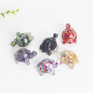 Handcrafted crystal turtle figurines with colorful crushed stone and gold foil accents