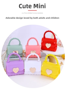 Macro detail of mini heart jelly handbags in six colors with golden chain straps