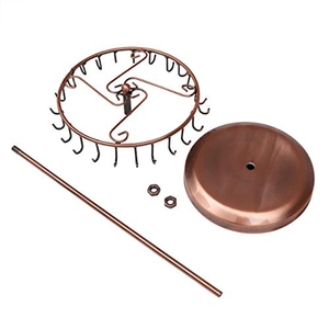 Disassembled parts of bronze rotating jewelry stand with hooks and metal base