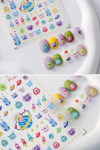 Detail of 3D embossed nail art stickers with cartoon monsters and space rocket themes