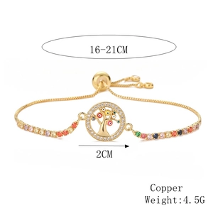 Detailed view of Tree of Life bracelet with colorful evil eye charms and adjustable chain