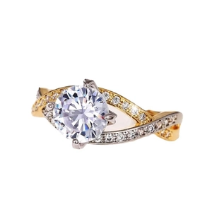 Classic four-prong solitaire ring with two-tone twisted band and micro-pave setting
