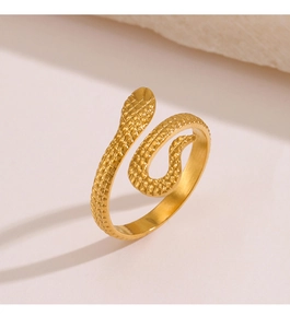 Macro shot of gold snake ring featuring detailed scale texture and adjustable wrap design
