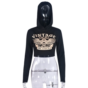 Close-up of vintage biker wing print on black cropped long sleeve hooded sweatshirt