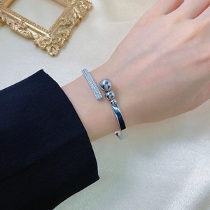 Polished silver titanium steel open bracelet with sparkling zircons and gradient beads