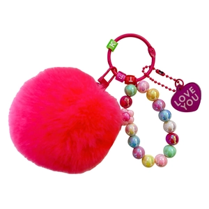 Cute pink pom-pom keychain with colorful beads and a heart charm for girls' bags