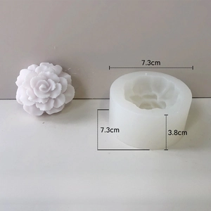Detailed view of rose silicone mold with finished floral candle showing precise dimensions