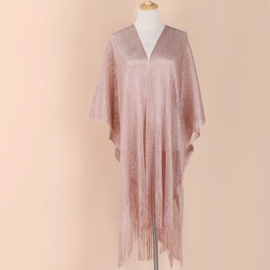 Detail of rose gold metallic pashmina featuring shimmering texture and long fringe tassels