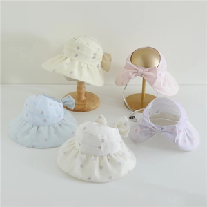 Kids floral sun visors with bow decor in yellow, pink, blue, white, and purple