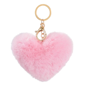 Close-up of heart-shaped pink plush keychain with golden metal spring clasp and ring
