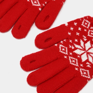 Red Christmas knit gloves with white snowflake patterns and touchscreen finger openings