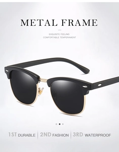 Klassische Halbrahmen-Sonnenbrille mit schwarzem Oberteil und goldenem Metallunterrand
