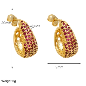 Detail view of 18k gold plated earrings featuring measurements and red zircon stones