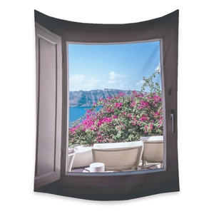 Detail of bohemian tapestry featuring Santorini sea view and pink bougainvillea flowers