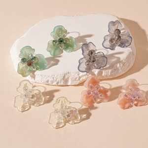 Elegant floral resin crystal hoop earrings in green, blue, pink and iridescent colors