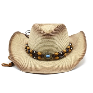 Detail of western straw hat featuring ethnic beaded band with turquoise and wood beads