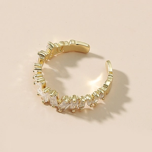 Adjustable gold plated open ring featuring emerald-cut cubic zirconia in a claw setting