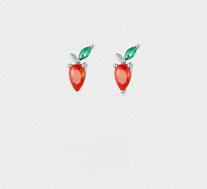 Detailed close-up of S925 silver carrot stud earrings with orange and green gems