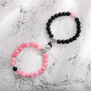 Magnetic couples bracelets with natural matte black and pink marble stone beads