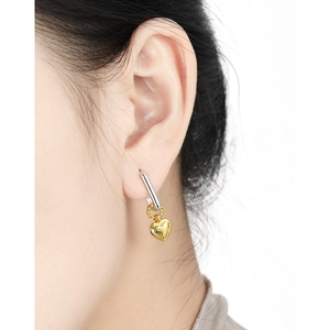 Elegant two-tone S925 silver heart drop earrings with rectangular hooks on female model