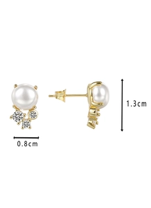 Detail view of pearl and cubic zirconia stud earrings with dimensions of 1.3cm by 0.8cm