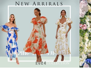 Detail of floral puff sleeve midi dresses with cutout waist and tiered skirt design