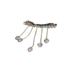 Elegant crystal fringe hair clip with golden chains and iridescent beads on white base