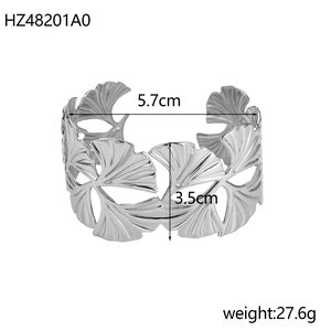 Detail of silver hollow ginkgo leaf open cuff bracelet with dimensions 5.7cm by 3.5cm