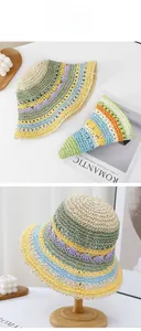 Detail of colorful striped crochet sun hat showing vibrant knit texture and wave pattern
