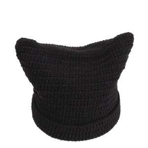 Chic black knit cat ear beanie with chunky texture and warm crochet daisy details