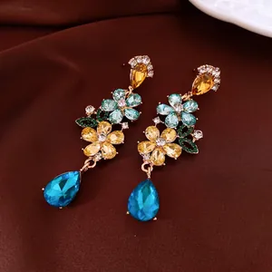 French luxury floral tassel earrings with colorful crystals and blue teardrop stones