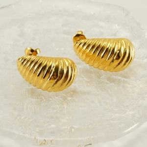 Elegant gold spiral swirl stainless steel hoop earrings with unique textured finish