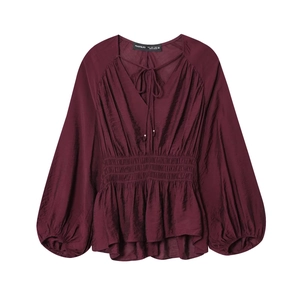 Deep wine red lantern sleeve blouse with V-neck tie and elastic waist peplum detail