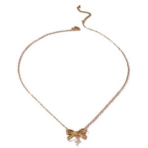 Elegant gold bow necklace with a white pearl drop pendant on minimalist fine chain