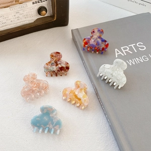Set of 6 mini acetate hair claws with marble and tortoiseshell patterns for women