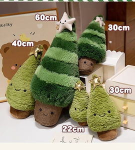 Various sizes of plush green Christmas tree dolls with smiling faces and star toppers