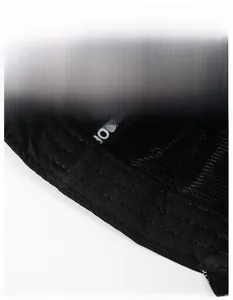 Detailed close-up of the wide moisture-wicking sweatband inside the black baseball cap