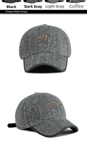 Detail view of winter herringbone baseball cap featuring a leather logo patch and four colors
