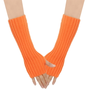 Detailed knit texture of orange fingerless arm warmers with thumb hole design