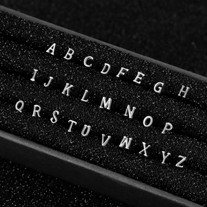 S925 sterling silver nose studs featuring 26 alphabets on black velvet display set