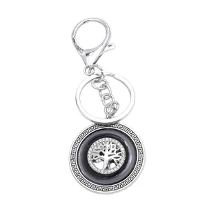 Silver tree of life keychain with blue evil eye and sparkling rhinestones for car keys