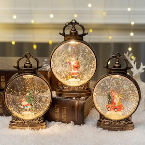 Vintage bronze Christmas snow globe lanterns with Santa and snowman scenes and warm LED light