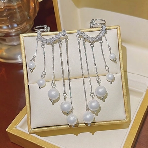 Elegant pearl tassel drop earrings with sparkling zircon inlay in a velvet jewelry box