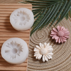 Detailed macro view of daisy flower silicone molds showing intricate petal textures
